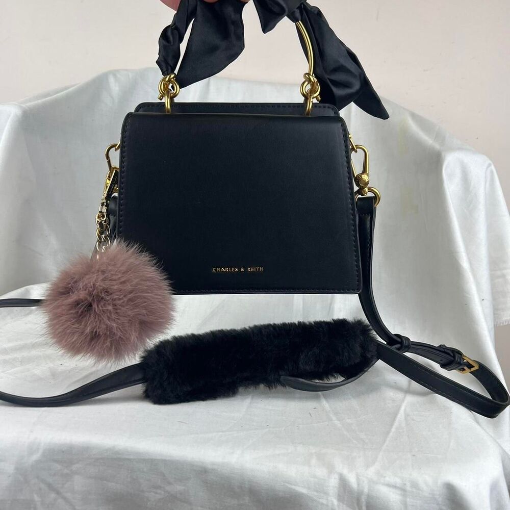 Charles & Keith Black Handbag with Gold Hardware and Fur Strap